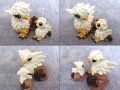 mama_and_baby_gryphon_by_dragonsandbeasties-d628wck.jpg